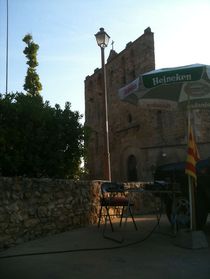 Work place against the background of Castle Peratallada